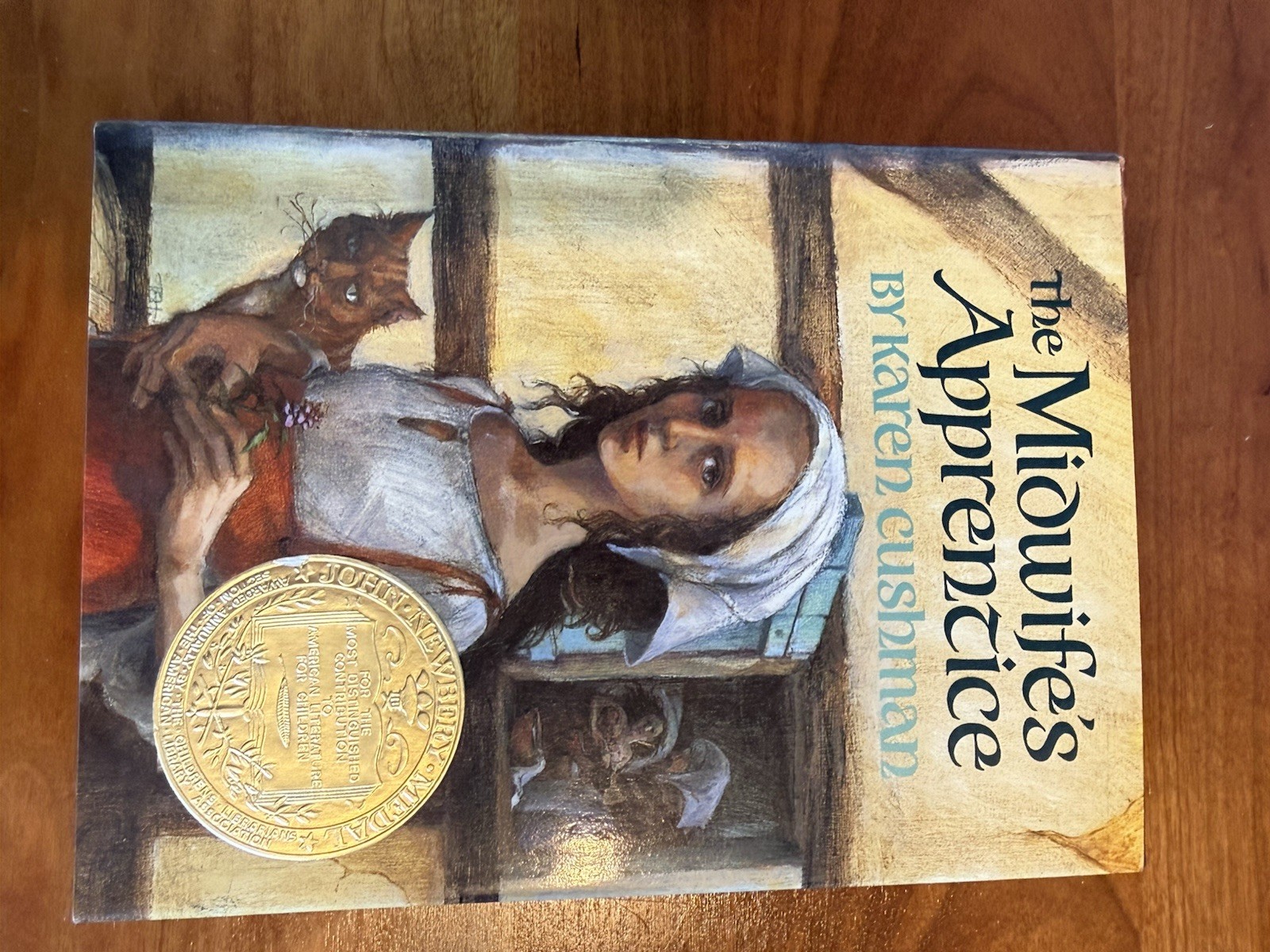 Exceptional mint hardback book: The Midwife’s Apprentice by Karen Cushman 1995